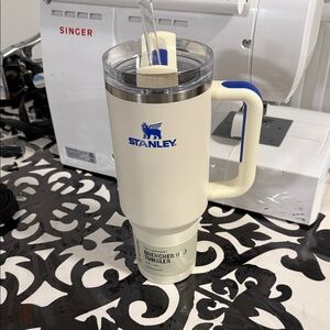 Stanley Cream Tumbler with Blue Handle